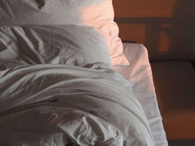 Comfortable bed representing a supportive sleep environment and personalized care for neurodivergent sleep needs in Denver, CO.