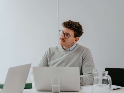 Person working, illustrating the pressure and high achievement that can contribute to burnout and sleep difficulties addressed through burnout therapy in Denver, CO.